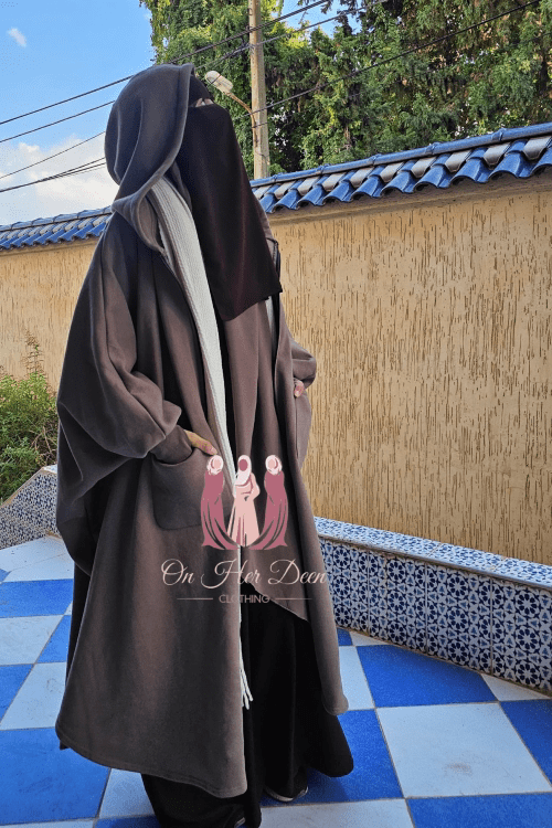 Women wearing a oversized exclusive poncho fleece from OnHerDeen Clothing modest fashion