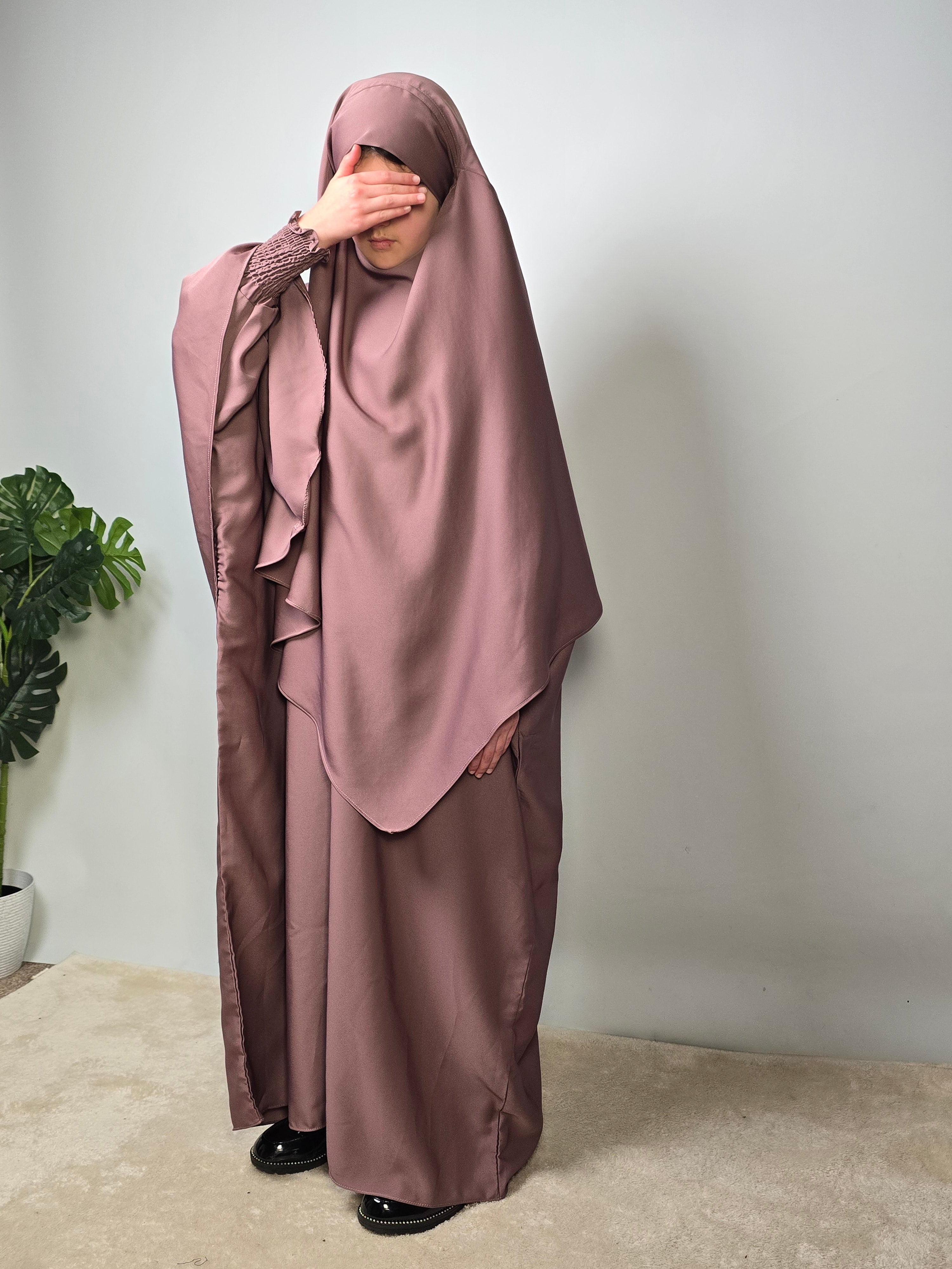Girls in matching abaya khimar set