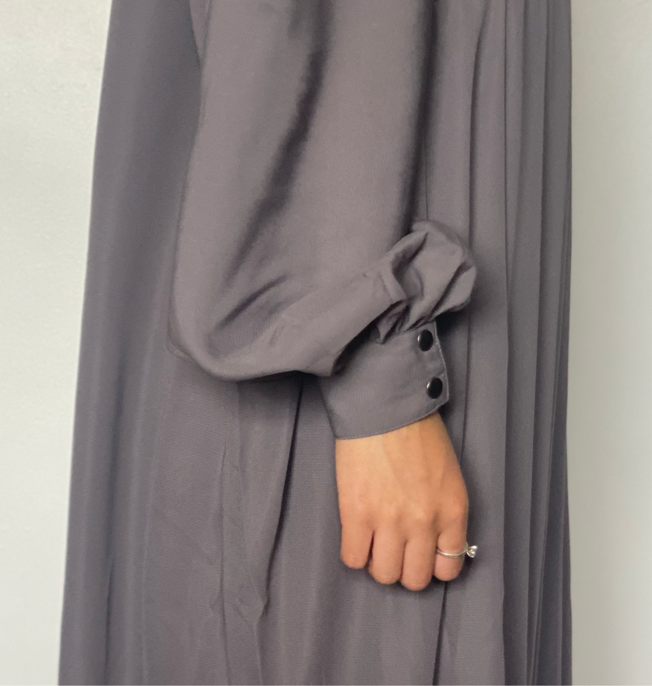 a Girls arm showing the detail on the puff sleeve abaya