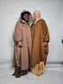 Two women in Al haya oversized poncho abaya fleece in mocha and taupe colours on a white background 