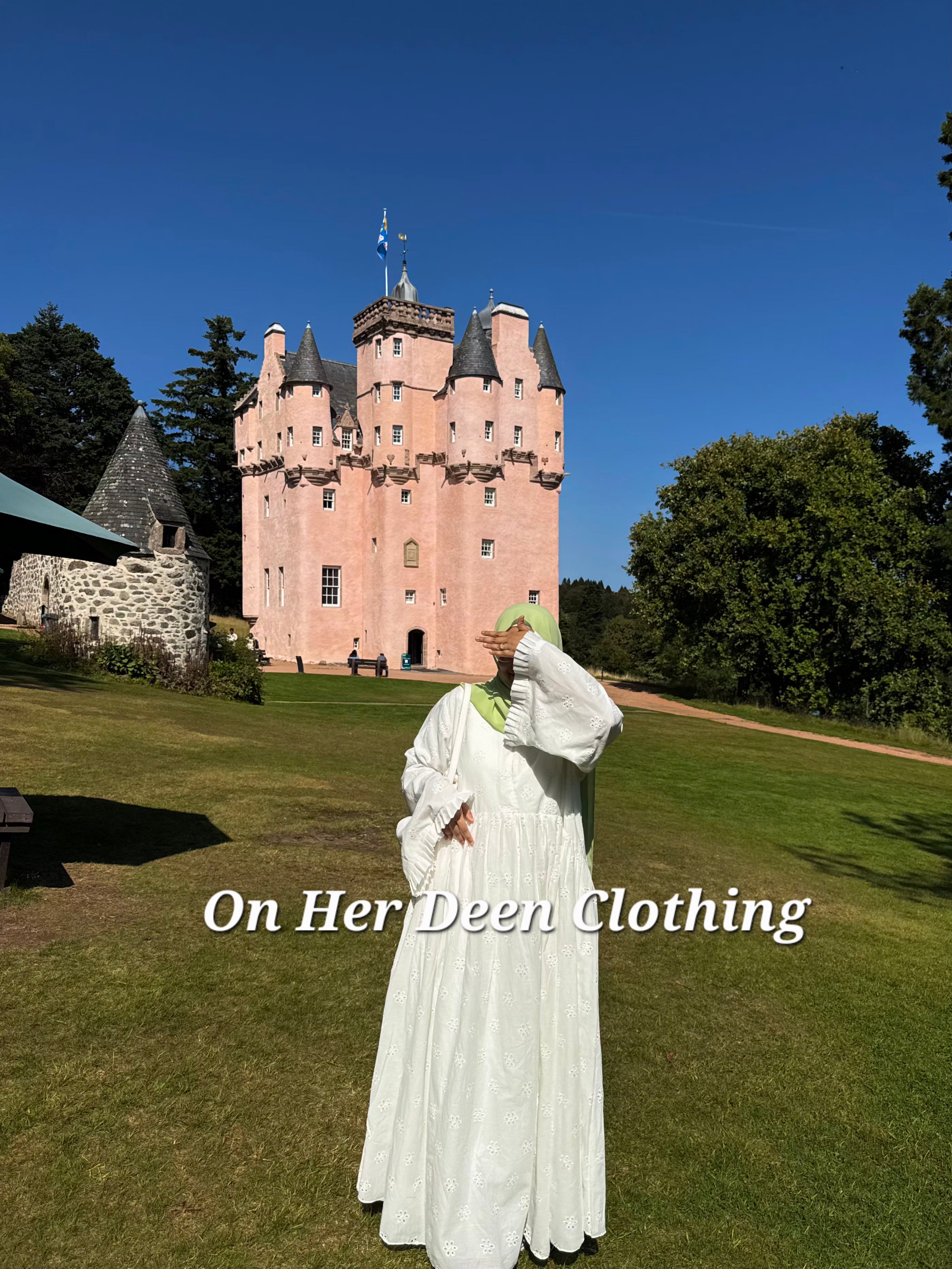 Close-up of eyelet cotton abaya sleeve with floral detail and petite ruffle