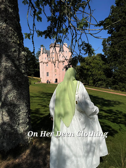 Fully lined eyelet cotton abaya in 100% cotton with floral detail and wide sleeves
