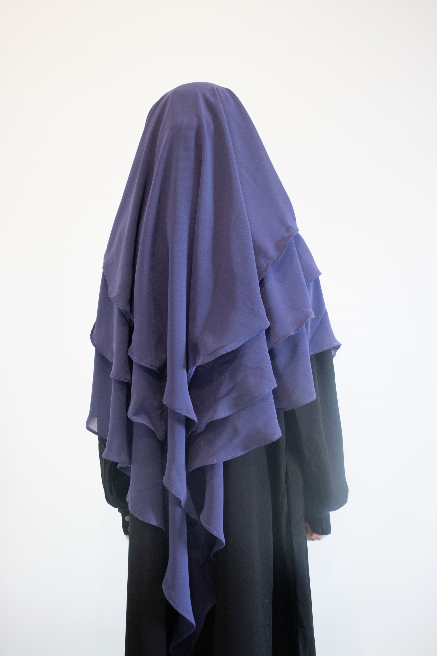 Girls wearing indigo 3 layer chiffon khimar hijab with a black abaya girls modest clothing 