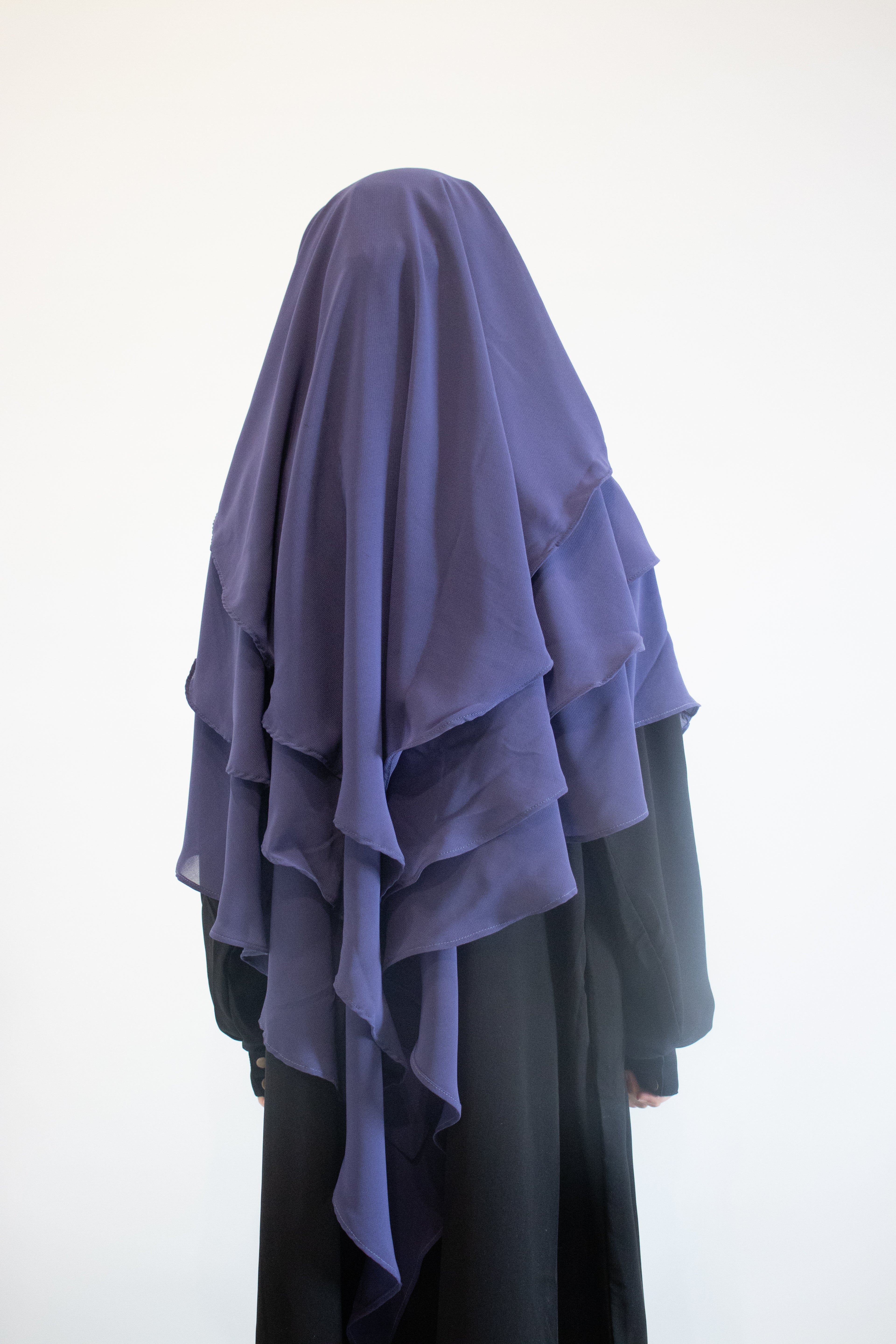 Girls wearing indigo 3 layer chiffon khimar hijab with a black abaya girls modest clothing 