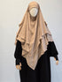Beige 3 layer khimar with black coat with thumbhole  sleeves on a plain background